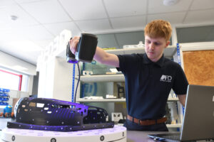 image of Airframe Designs engineer 3D scanning a component for blog Signs You Need An Aerospace Engineering Consultancy For Your Project